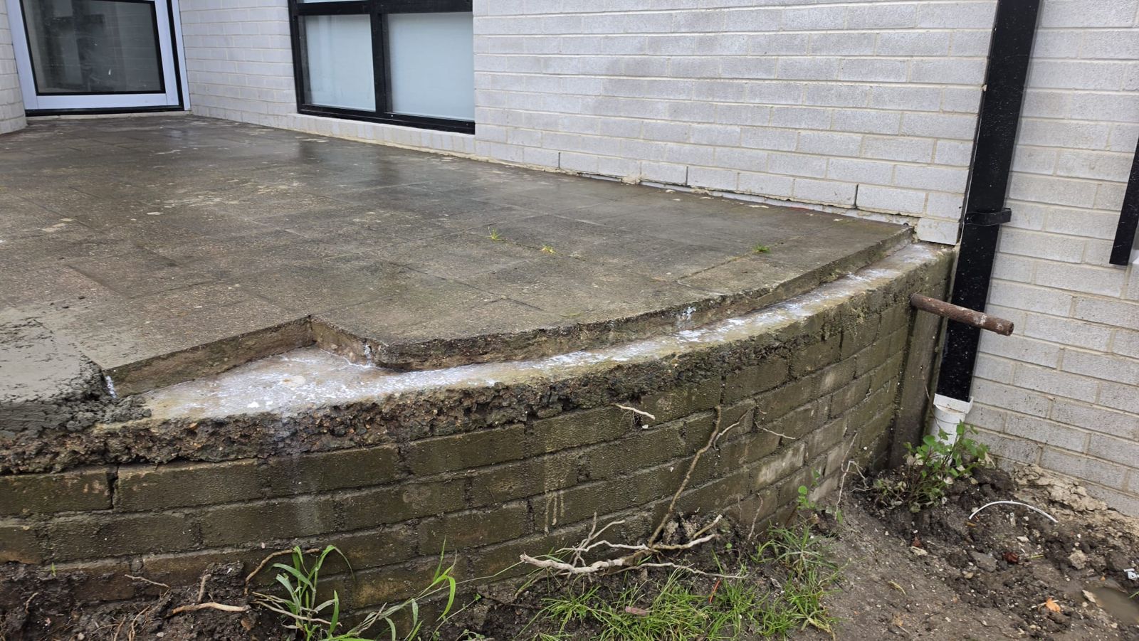 Worn concrete porch slab before resurfacing